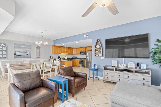 3401 N Ocean Blvd Unit 309, North Myrtle Beach, SC 29582 - living area featuring ceiling fan, light tile patterned flooring, and a chandelier