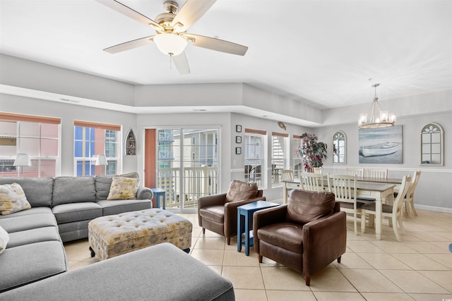 3401 N Ocean Blvd Unit 309, North Myrtle Beach, SC 29582 - living room featuring light tile patterned flooring, a chandelier, and a ceiling fan