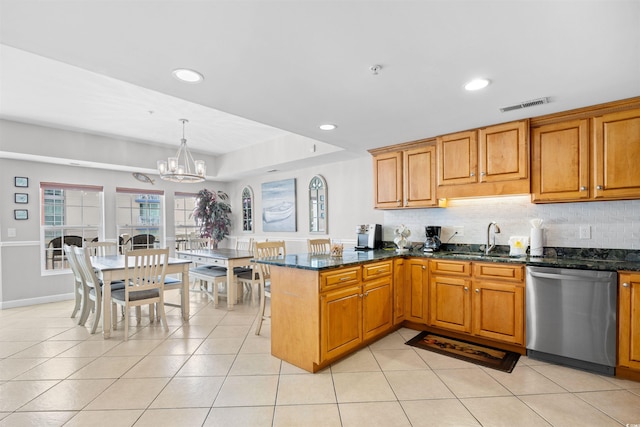 3401 N Ocean Blvd Unit 309, North Myrtle Beach, SC 29582 - kitchen with stainless steel dishwasher, a sink, brown cabinetry, a peninsula, and recessed lighting