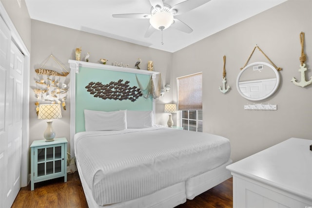 3401 N Ocean Blvd Unit 309, North Myrtle Beach, SC 29582 - bedroom with wood finished floors, a closet, and a ceiling fan