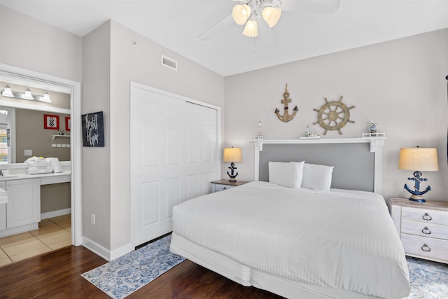 3401 N Ocean Blvd Unit 309, North Myrtle Beach, SC 29582 - bedroom with wood finished floors, a closet, ceiling fan, and baseboards