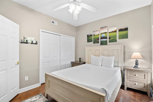 3401 N Ocean Blvd Unit 309, North Myrtle Beach, SC 29582 - bedroom featuring a closet, dark wood finished floors, baseboards, and a ceiling fan