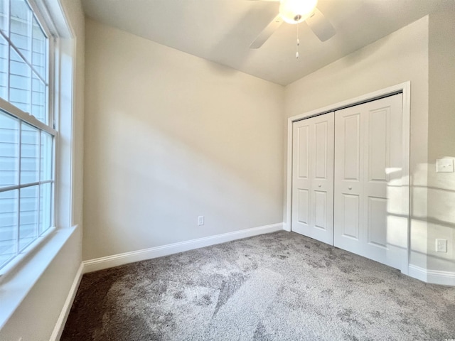 2593 Main St, Loris, SC 29569 - unfurnished bedroom featuring carpet floors, multiple windows, and baseboards