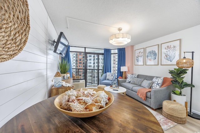 1501 S Ocean Blvd Unit 1250, Myrtle Beach, SC 29577 - living area featuring wood finished floors and a textured ceiling
