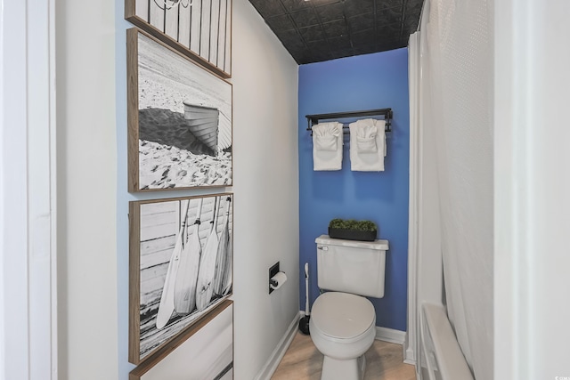1501 S Ocean Blvd Unit 1250, Myrtle Beach, SC 29577 - bathroom featuring toilet, wood finished floors, and baseboards