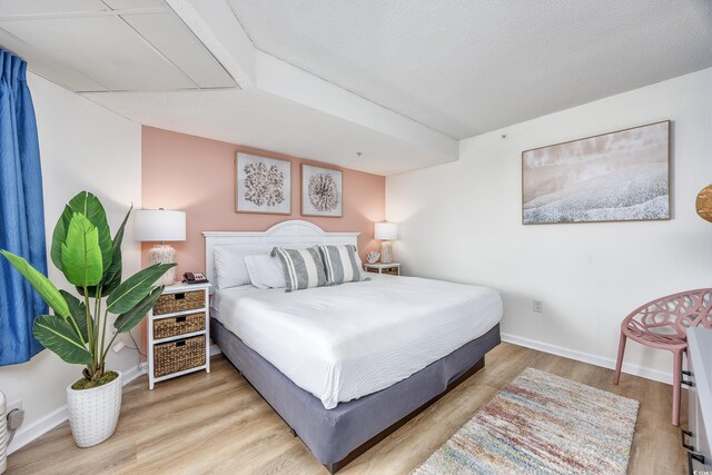 1501 S Ocean Blvd Unit 1250, Myrtle Beach, SC 29577 - bedroom with wood finished floors and baseboards