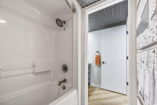 1501 S Ocean Blvd Unit 1250, Myrtle Beach, SC 29577 - bathroom with an ornate ceiling, wood finished floors, shower / bath combination, and baseboards