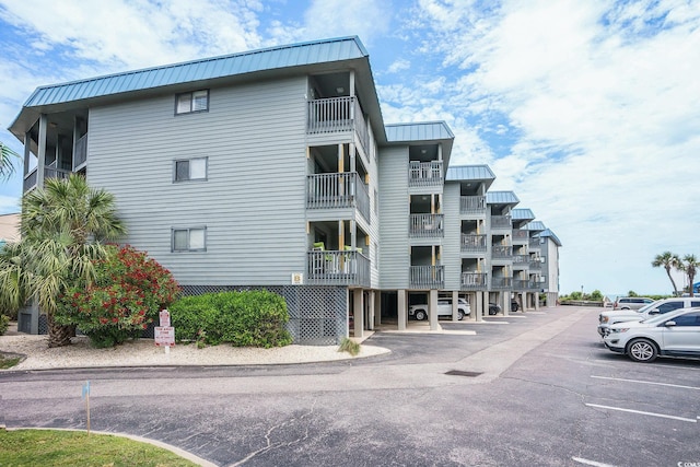 6000 N Ocean Blvd Unit 133, North Myrtle Beach, SC 29582 - view of apartment building / complex featuring uncovered parking