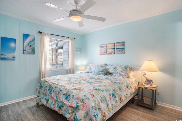 6000 N Ocean Blvd Unit 133, North Myrtle Beach, SC 29582 - bedroom with crown molding, baseboards, wood finished floors, ceiling fan, and a textured ceiling