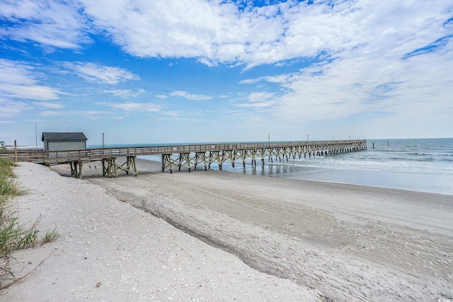 6000 N Ocean Blvd Unit 133, North Myrtle Beach, SC 29582 - dock area featuring a pier and view of water and beach