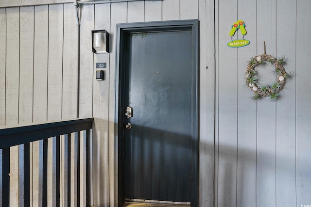 6000 N Ocean Blvd Unit 133, North Myrtle Beach, SC 29582 - property entrance with board and batten siding