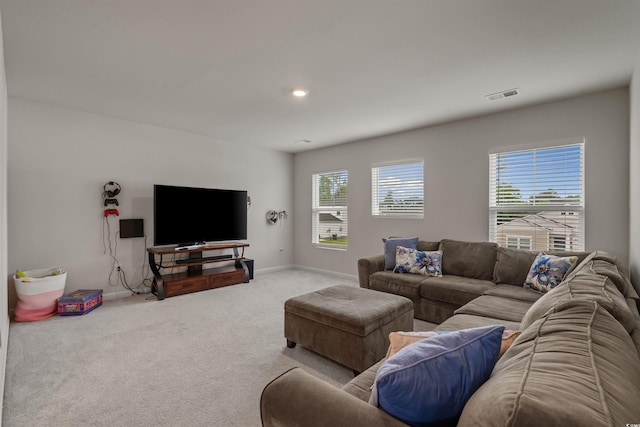 living area with carpet floors and baseboards
