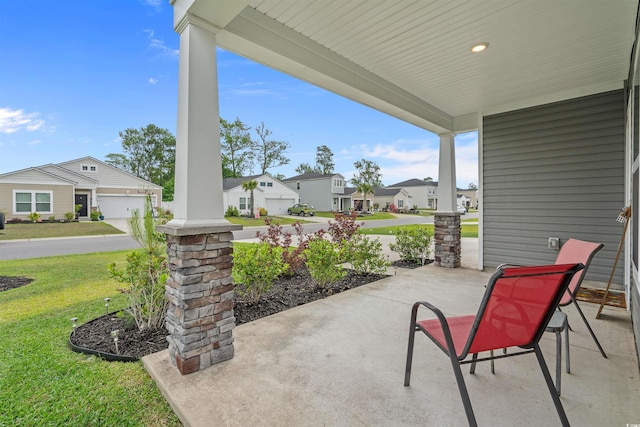 view of patio / terrace with a residential view