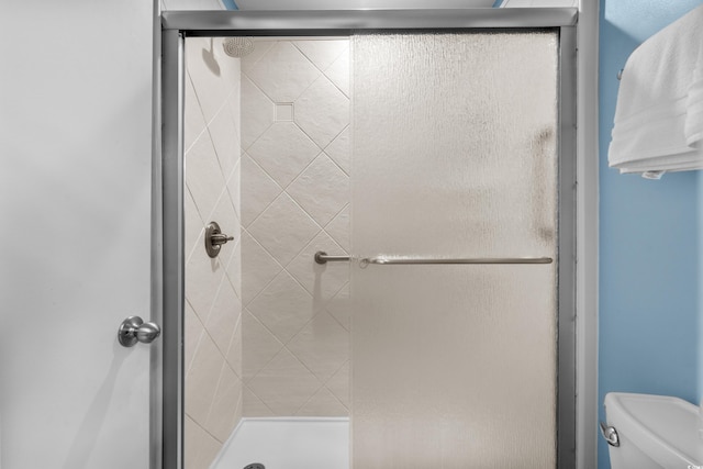 400 Melrose Pl Unit 14E, Myrtle Beach, SC 29572 - full bathroom featuring a shower stall and toilet