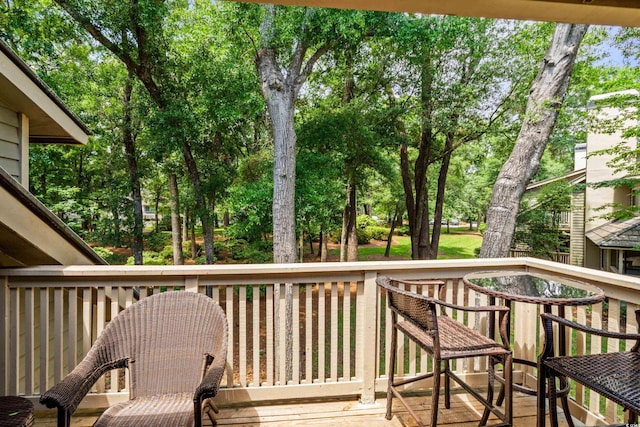 400 Melrose Pl Unit 14E, Myrtle Beach, SC 29572 - deck featuring view of wooded area