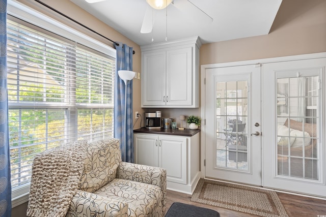 doorway to outside with plenty of natural light, french doors, and dark wood finished floors