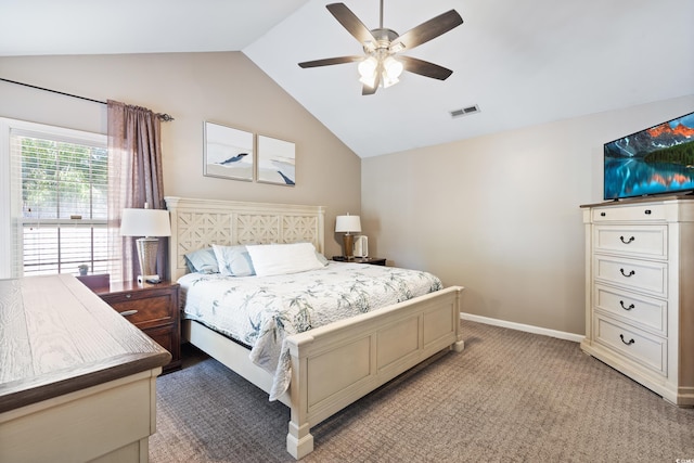 bedroom featuring lofted ceiling, light carpet, baseboards, and a ceiling fan