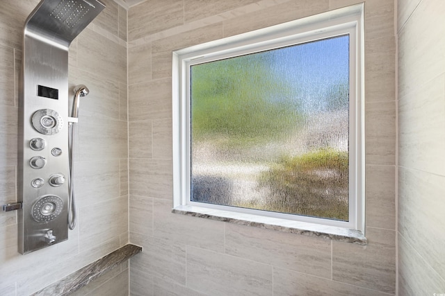 bathroom view of tiled shower