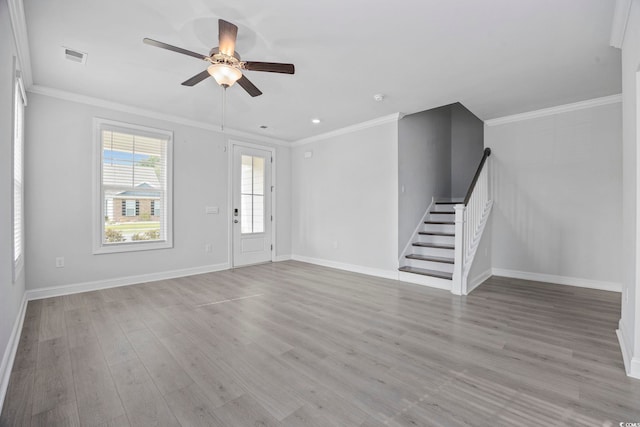 1303 Bermuda Grass Dr, Myrtle Beach, SC 29579 - entrance foyer featuring a ceiling fan, stairs, baseboards, light wood-style floors, and crown molding