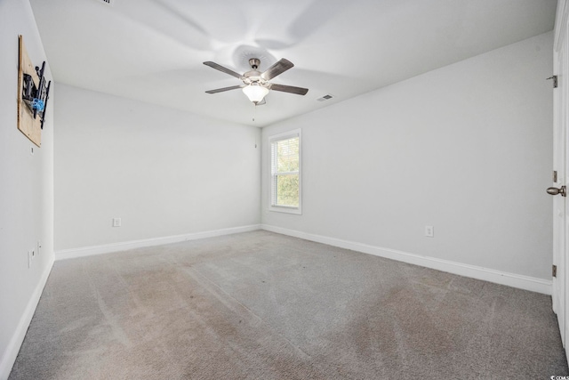 1303 Bermuda Grass Dr, Myrtle Beach, SC 29579 - empty room featuring carpet floors, baseboards, and ceiling fan