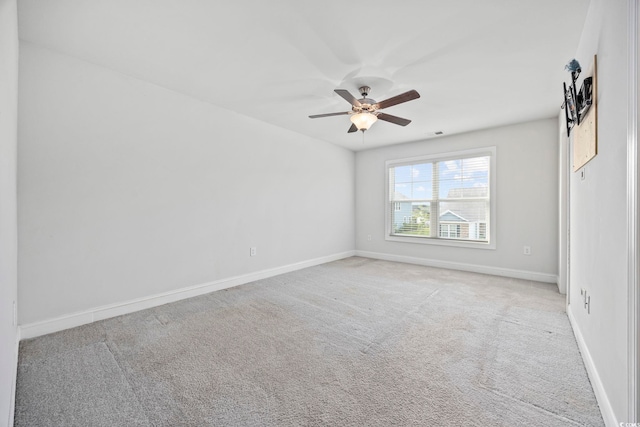 1303 Bermuda Grass Dr, Myrtle Beach, SC 29579 - empty room featuring a ceiling fan, baseboards, and light colored carpet