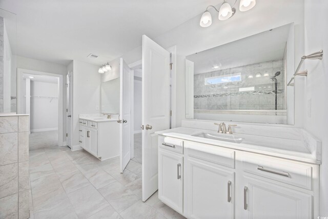 1303 Bermuda Grass Dr, Myrtle Beach, SC 29579 - full bath with marble finish floors, two vanities, a tile shower, and a spacious closet