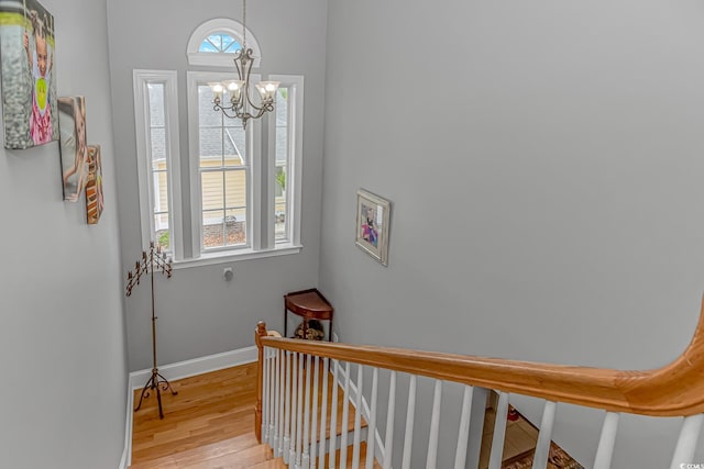 212 Greenwich Dr, Conway, SC 29526 - corridor featuring light wood-type flooring, baseboards, and a chandelier