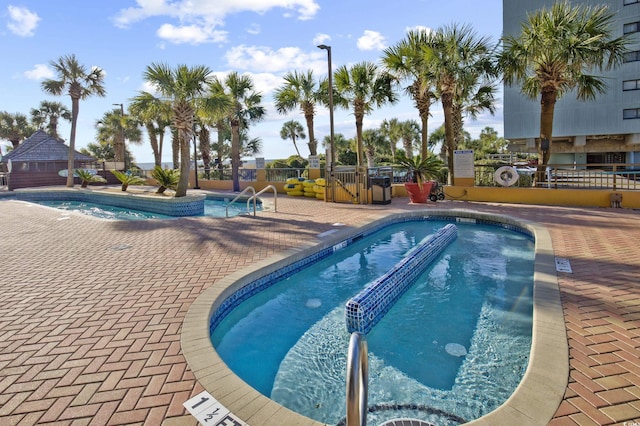 6900 N Ocean Blvd Unit 1437, Myrtle Beach, SC 29572 - community pool with fence and a patio area