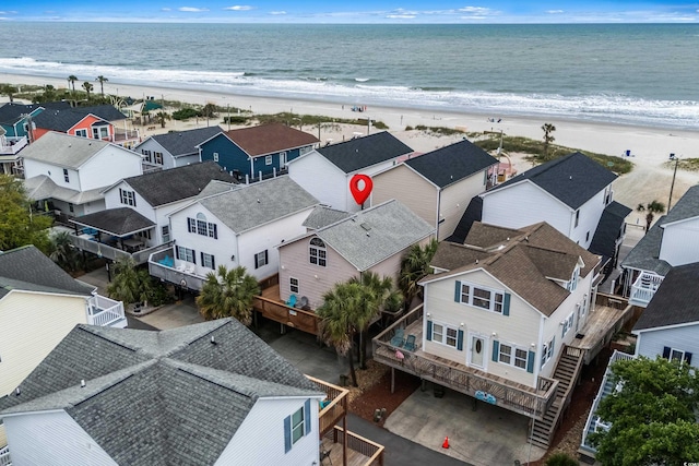 aerial perspective of suburban area with extended coastline