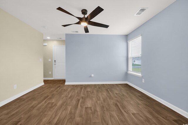 478 Samara Dr, Longs, SC 29568 - spare room featuring a ceiling fan, wood finished floors, and baseboards