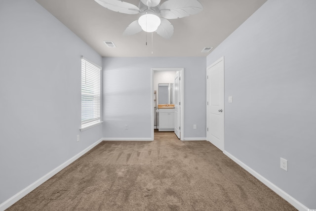 478 Samara Dr, Longs, SC 29568 - unfurnished bedroom with carpet, baseboards, ensuite bathroom, and ceiling fan