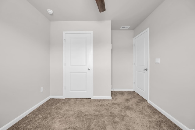 478 Samara Dr, Longs, SC 29568 - unfurnished bedroom with carpet flooring, baseboards, and ceiling fan