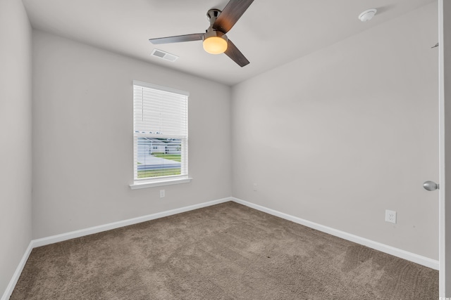 478 Samara Dr, Longs, SC 29568 - unfurnished room with carpet flooring, a ceiling fan, and baseboards