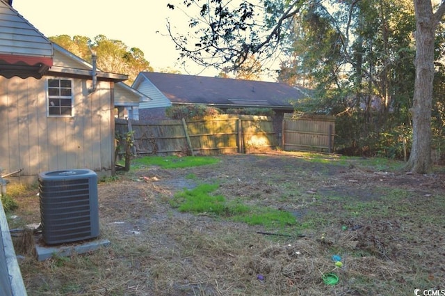 414 E Wine St, Mullins, SC 29574 - view of yard featuring cooling unit and fence