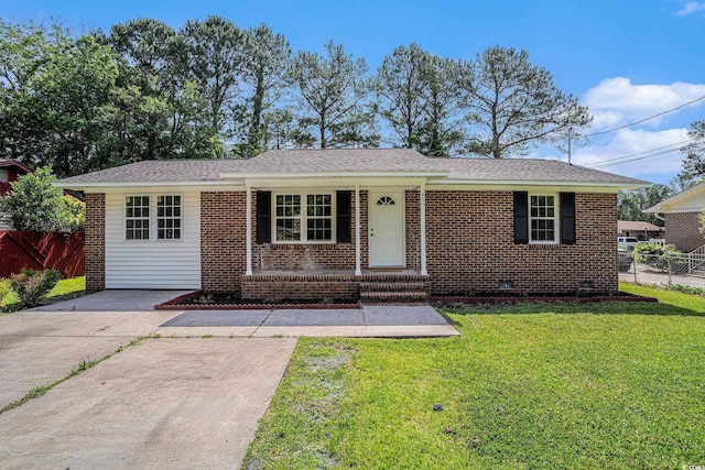 450 Player St, Georgetown, SC 29440 - view of front of home featuring brick siding and covered porch