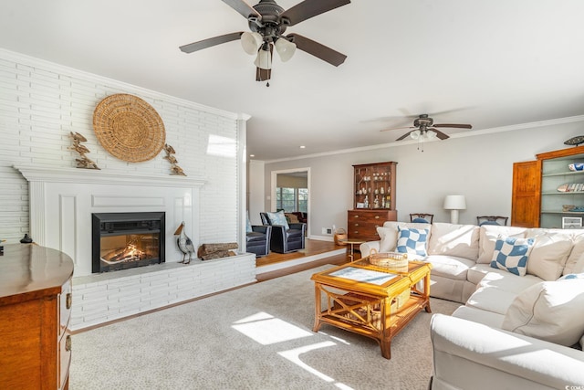 2604 S Bay St, Georgetown, SC 29440 - living area with a ceiling fan, crown molding, and a fireplace