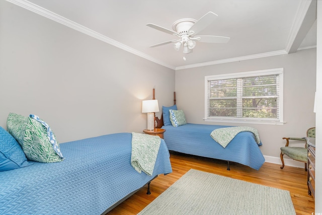 2604 S Bay St, Georgetown, SC 29440 - bedroom with ornamental molding, wood finished floors, baseboards, and ceiling fan