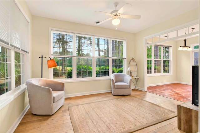 154 Windsor Cir SW, Ocean Isle Beach, NC 28469 - living area featuring baseboards, light wood-style floors, and ceiling fan