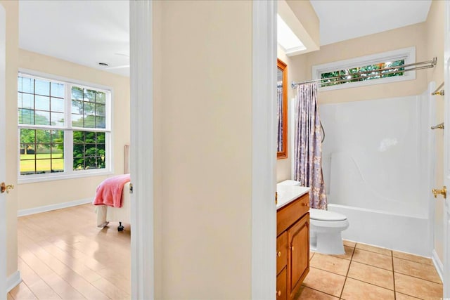154 Windsor Cir SW, Ocean Isle Beach, NC 28469 - full bathroom with vanity, toilet, shower / bath combo, and baseboards