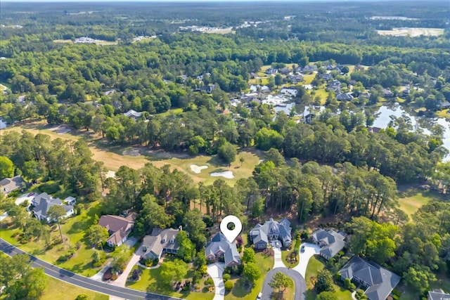 154 Windsor Cir SW, Ocean Isle Beach, NC 28469 - aerial overview of property's location with a forest and nearby suburban area