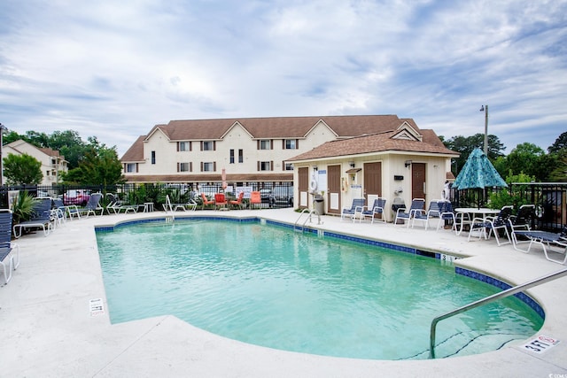510 Fairwood Lakes Dr Unit 17-P, Myrtle Beach, SC 29588 - community pool featuring fence and a patio