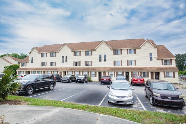 510 Fairwood Lakes Dr Unit 17-P, Myrtle Beach, SC 29588 - view of building exterior with uncovered parking