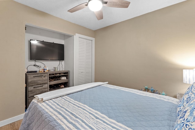 625 N Waccamaw Dr Unit 107, Murrells Inlet, SC 29576 - bedroom with wood finished floors, baseboards, and a ceiling fan