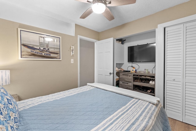 625 N Waccamaw Dr Unit 107, Murrells Inlet, SC 29576 - bedroom with wood finished floors and ceiling fan