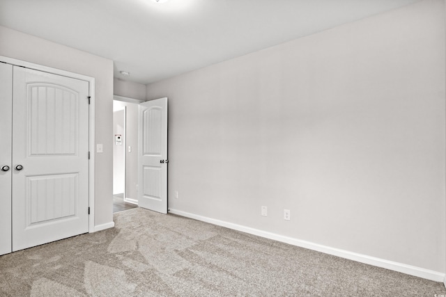 154 Six Mile Creek Dr, Georgetown, SC 29440 - unfurnished bedroom featuring carpet, baseboards, and a closet