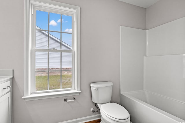 154 Six Mile Creek Dr, Georgetown, SC 29440 - bathroom with toilet, vanity, baseboards, and shower / tub combination
