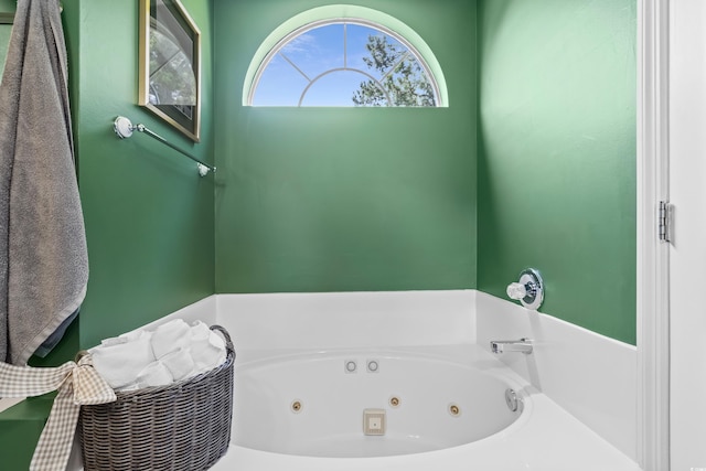 bathroom featuring a whirlpool tub