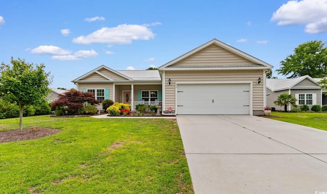 ranch-style home featuring a garage, concrete driveway, a front lawn, and covered porch