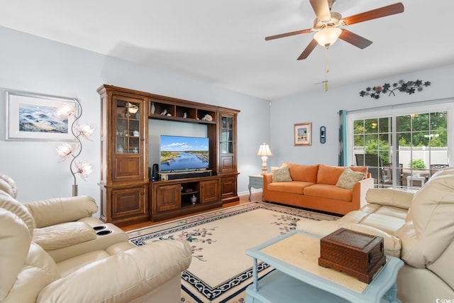 living room featuring ceiling fan