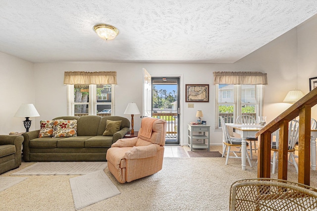 2191 Liberty Cir, Little River, SC 29566 - living area featuring a textured ceiling, plenty of natural light, and light carpet